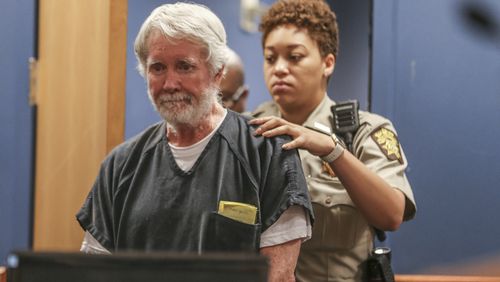 June 6, 2017 Atlanta: &amp;nbsp;Fulton County deputy, K. Jackson brings Claud &#034;Tex&#034; McIver into the courtroom. Atlanta attorney, Claud &#034;Tex&#034; McIver was arraigned for murder on Tuesday, June 6, 2017. McIver appeared before judge Robert McBurney. McIver shot his wife Diane as they rode in their SUV in midtown Atlanta in the fall of 2016. McIver has said it was an accident and initially faced involuntary manslaughter charges. A grand jury indicted him for murder in April. A judge revoked his bond after officers found a gun in his home. Judge McBurney is reviewing material presented at today&amp;#146;s hearing to determine whether bond will be granted. JOHN SPINK/JSPINK@AJC.COM.
