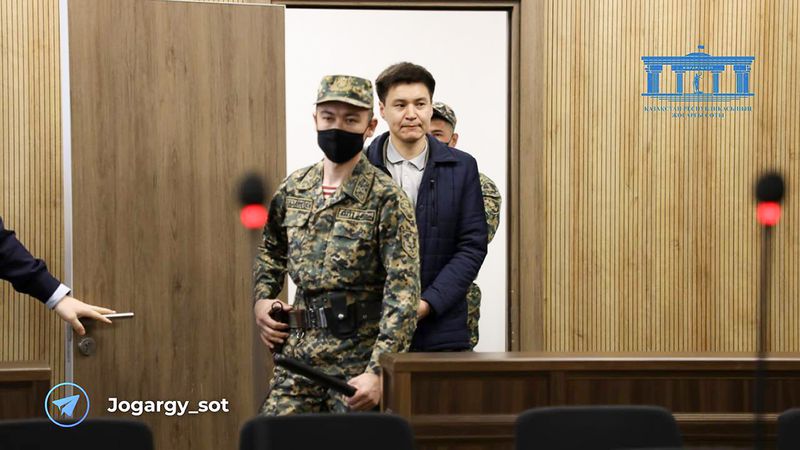 In this photo released by The Kazakhstan Supreme Court Press Office’s Telegram channel on Friday, April 19, 2024, businessman Kuandyk Bishimbayev, the country’s former economy minister, is escorted into court in Astana, Kazakhstan. The trial of Bishimbayev in the death of his wife, Saltanat Nukenova, has touched a nerve in the Central Asian country. Tens of thousands of people have signed petitions calling for harsher penalties for domestic violence. On April 11, senators approved a bill toughening penalties for spousal abuse, and President Kassym-Jomart Tokayev signed it into law four days later. (The Kazakhstan Supreme Court Press Office telegram channel via AP)