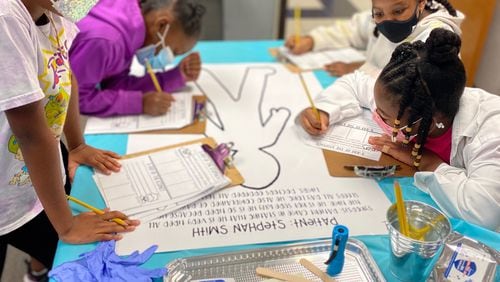 Students at Lovin Elementary in Lawrenceville dissected reading passages during a day that transformed their classrooms into a "surgical" center.