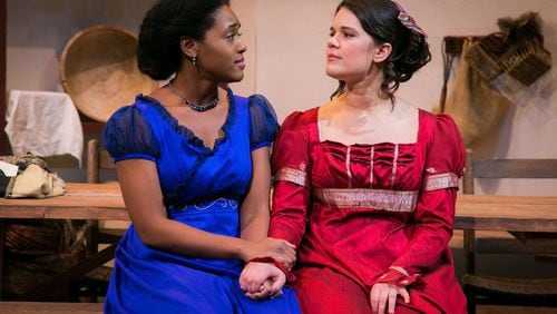 Jasmine Thomas (left) and Erika Miranda appear in “The Wickhams: Christmas at Pemberley” at Theatrical Outfit. CONTRIBUTED BY CASEY GARDNER