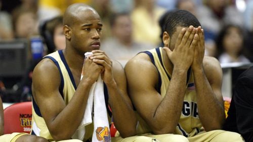 Georgia Tech's Jarrett Jack (left) and B.J. Elder sit dejected on the bench in the second half of their national championship loss to UConn Monday, April 5, 2004, at the Alamodome in San Antonio.