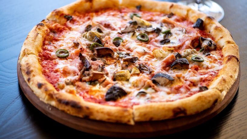 Tre Vele's menu includes a quattro stagioni pizza. Mia Yakel for The Atlanta Journal-Constitution