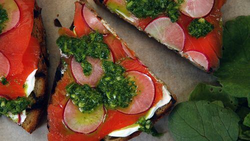 Salmon and radish green salsa verde toasts. (Glenn Koenig/Los Angeles Times/TNS)