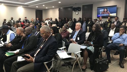 Dozens of taxi drivers showed up at an Atlanta city council transportation committee meeting on Feb. 15, 2017 to show their concern with a new taxi vehicle age limit.