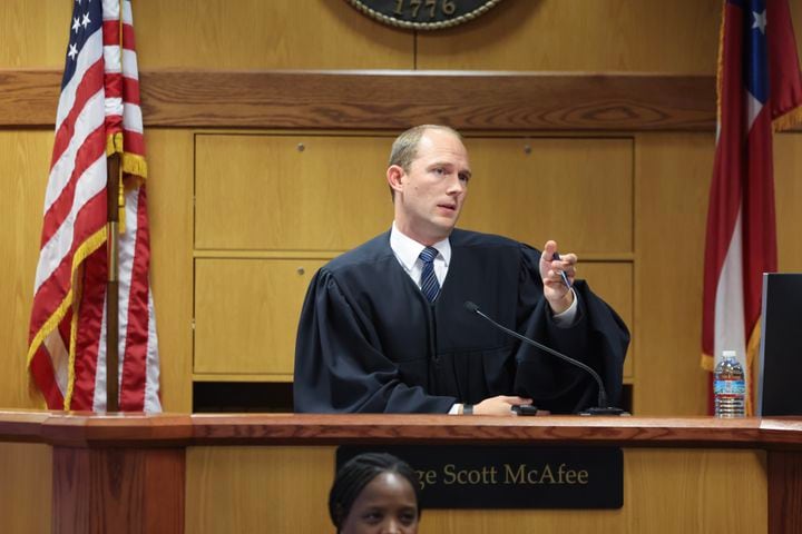 Fulton County Superior Judge Scott McAfee hears motions from attorneys representing Ken Chesebro and Sidney Powell in Atlanta on Wednesday, Sept. 6, 2023. At the end of the 90-minute hearing, McAfee granted Powell’s demand for a speedy trial, setting her trial date for Oct. 23, the same day as Chesebro’s. He denied a push from Chesebro to sever his case from Powell and a motion from Powell to sever her case from Chesebro’s. (Jason Getz / Jason.Getz@ajc.com)