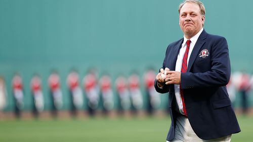 BOSTON, MA - AUGUST 03: Former Boston Red Sox pitcher Curt Schilling #38 throws out the first pitch after being inducted into the Red Sox Hall of Fame prior to the game against the Minnesota Twins during the game on August 3, 2012 at Fenway Park in Boston, Massachusetts. (Photo by Jared Wickerham/Getty Images)