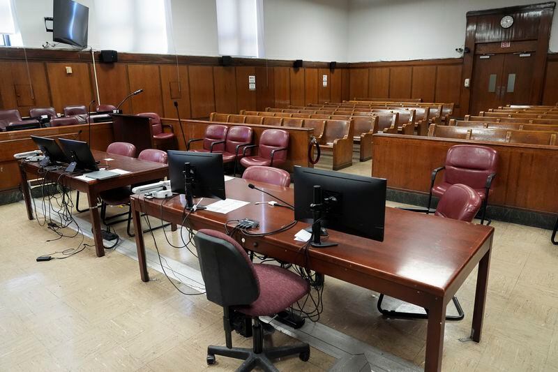 Judge Juan Merchan's Manhattan courtroom sits empty between proceedings, Tuesday, March 12, 2024, in New York. A dozen Manhattan residents are soon to become the first Americans ever to sit in judgment of a former president charged with a crime. Jury selection is set to start Monday in former President Donald Trump's hush-money trial. (AP Photo/Seth Wenig)