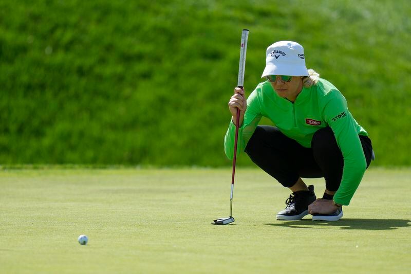 Madelene Sagstrom, of Sweden lines up shot on the second hole during the first round of the LPGA Cognizant Founders Cup golf tournament, Thursday, May 9, 2024, in Clifton, N.J. (AP Photo/Seth Wenig)