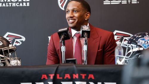 First-round selection quarterback Michael Penix Jr. speaks during the Atlanta Falcons introductory press conference at the Falcons Headquarters in Flowery Branch on Friday, April 26, 2024. (Natrice Miller/ AJC)
