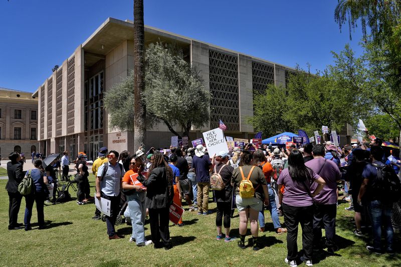 Abortion rights supporters gather outside the Capitol, Wednesday, April 17, 2024, in Phoenix. House Republicans have again blocked an effort for the chamber to take up legislation that would repeal Arizona’s near-total ban on abortions. (AP Photo/Matt York)
