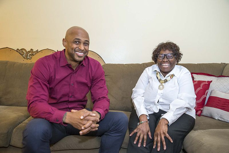 11/15/2019 -- Atlanta, Georgia -- "I call him Iron Man," says Velma Dunn (right), 69, as she jokes with Christopher Milton, 40, at her residence in Atlanta.(Alyssa Pointer/Atlanta Journal Constitution)