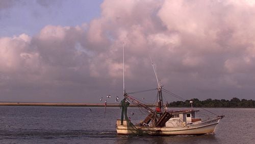 A shrimp boat on the Apalachicola River at sunset. (Paul J. Milette/The Palm Beach Post)