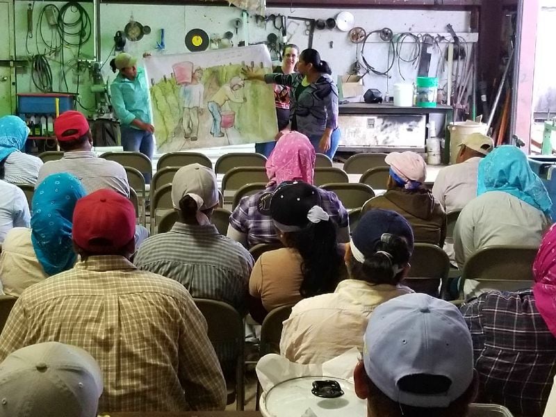 Lupe Gonzalo of the Coalition of Immokalee Workers conducting a "know your rights" education session in the Bainbridge, Georgia area.