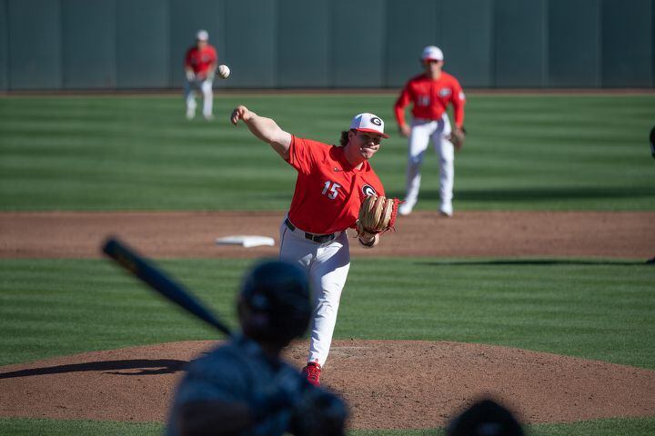 Bulldogs pitcher Matthew Hoskins delivers during the 20th Spring Classic game against Georgia Tech on Sunday at Coolray Field in Lawrenceville. (Jamie Spaar / for The Atlanta Journal-Constitution)