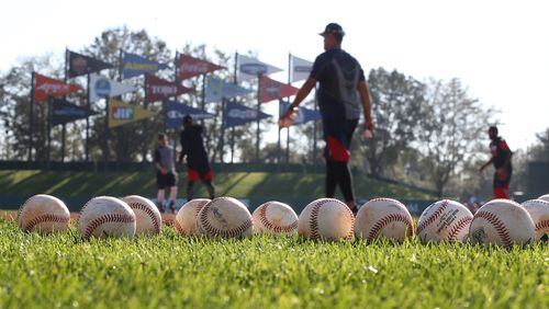 Baseballs already cover the field in the early morning light during spring training at Champion Stadium on Monday Feb. 20, 2017, at the ESPN Wide World of Sports in Lake Buena Vista.   Curtis Compton/ccompton@ajc.com