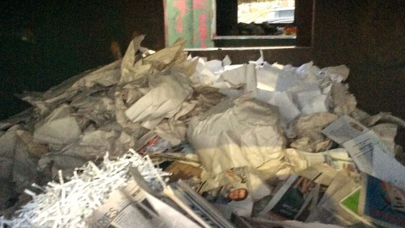 This is a photograph of the interior of the paper recycling dumpster at the Your DeKalb Farmers Market where thousands of confidential documents were discovered by a person doing her own recycling.  She later took this photo.