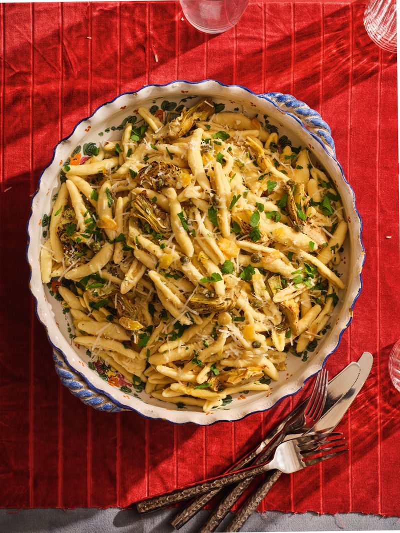 Cavatellin with Roasted Artichokes and Preserved Lemon is a recipe in the cookbook "Anything’s Pastable: 81 Inventive Pasta Recipes for Saucy People" by Dan Pashman.