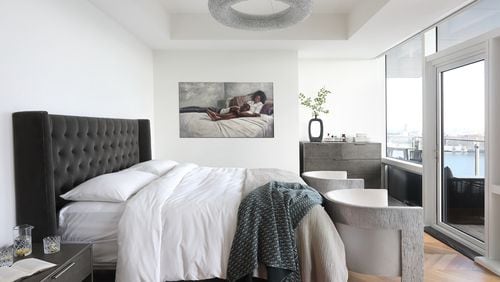 Changing up your bed linens can give a design refresh to your space.
(Courtesy of Studio 7 Design Group)
