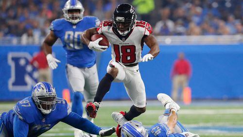 Atlanta Falcons wide receiver Taylor Gabriel (18) leaps over Detroit Lions linebacker Nick Bellore (43) during the first half of an NFL football game, Sunday, Sept. 24, 2017, in Detroit. (AP Photo/Rick Osentoski)