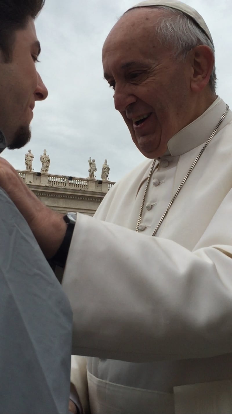 Dacula teen Gino Vizzi is blessed by Pope Francis in Rome during a mass. SPECIAL