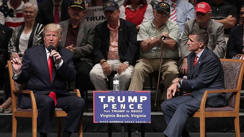 FILE PHOTO: Republican presidential nominee Donald Trump (L) speaks during a campaign event September 6, 2016 in Virginia Beach, Virginia. Trump participated in a discussion with retired Army Lieutenant General Michael Flynn (R).  (Photo by Alex Wong/Getty Images)