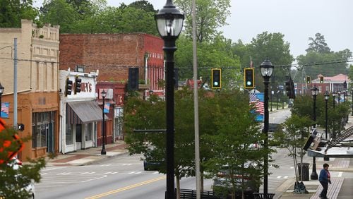 Downtown Sparta is mostly quiet on Wednesday. Sparta is the county seat of Hancock County, which now has the fourth highest number of COVID-19 cases per capita in Georgia. (PHOTO by Curtis Compton ccompton@ajc.com)