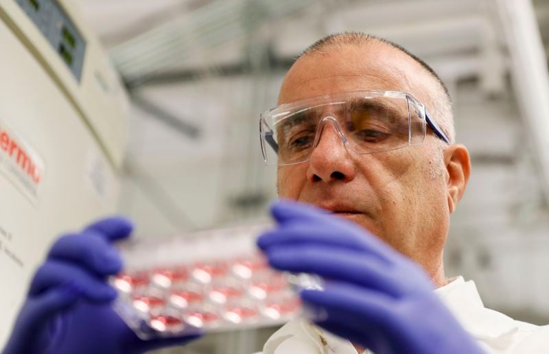 March 17, 2020 - Smyrna - Farshad Guirakhoo, Chief Scientific Officer at Smyrna-based GeoVax, checks on one of the vaccine candidates for COVID-19 that his lab is working on.  At least a half-dozen efforts are underway in Georgia to research, develop treatments and vaccines for COVID-19.    Bob Andres / robert.andres@ajc.com