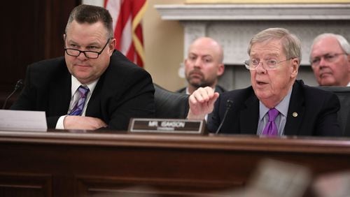 Senate Veterans’ Affairs Committee Chairman Johnny Isakson, R-Ga., (right) questions Veterans Affairs Secretary David Shulkin during a hearing last year. Last week, Isakson asked the VA to address concerns over a new program to help poisoned Marine veterans who served at Camp Lejeune, N.C. CHIP SOMODEVILLA / GETTY IMAGES
