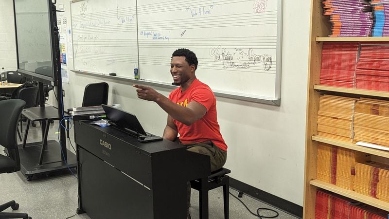 Emorja Roberson, music director for "Let Us March On," leads a rehearsal at Martha Ellen Stilwell School of the Arts.