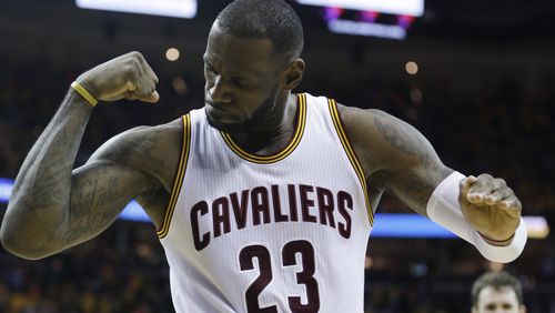 Cleveland Cavaliers' LeBron James (23) celebrates against the Atlanta Hawks in the second half in Game 1 of a second-round NBA basketball playoff series, Monday, May 2, 2016, in Cleveland. The Cavs won 104-93. (AP Photo/Tony Dejak)