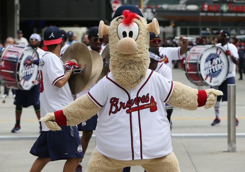 Braves mascot Blooper performs with the Heavy Hitters drumline during pre-game activities prior to the Braves' season opener at SunTrust. . (Curtis Compton/ccompton@ajc.com)
