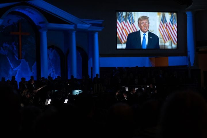 Former President Donald Trump gives a recorded video greeting during the Legacy Celebration Service for the Rev. Charles F. Stanley at First Baptist Atlanta on Sunday, April 23, 2023. (Photo: Ben Gray for The Atlanta Journal-Constitution)

