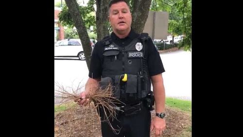 Marietta police  spokesman officer Chuck McPhilamy warns about a scam involving fraudsters selling pinestraw in a video posted to the department's Facebook.