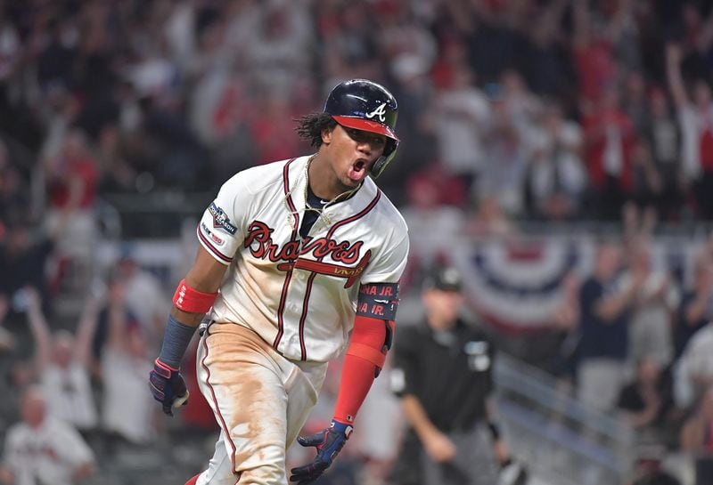 October 3, 2019 Atlanta - Atlanta Braves center fielder Ronald Acuna Jr. hits two run home run in 9th inning during Game 1 of best-of-five National League Division Series at SunTrust Park on Thursday, October 3, 2019. St. Louis Cardinals won 7-6 over the Atlanta Braves. (Hyosub Shin / Hyosub.Shin@ajc.com)
