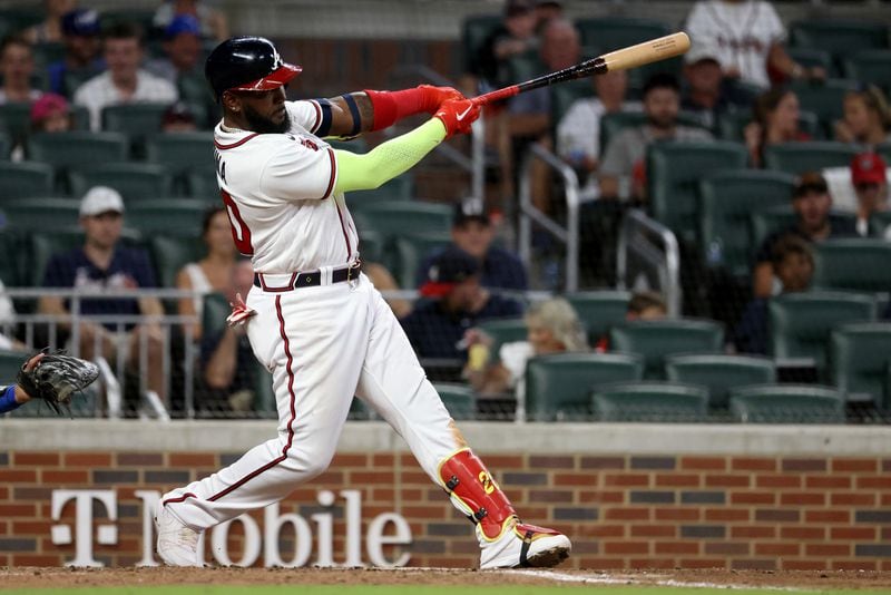 Braves designated hitter Marcell Ozuna hits a two-run home run against the Los Angeles Dodgers during the eighth inning to take a 5-3 lead at Truist Park Saturday, June 25, 2022, in Atlanta. (Jason Getz / Jason.Getz@ajc.com)