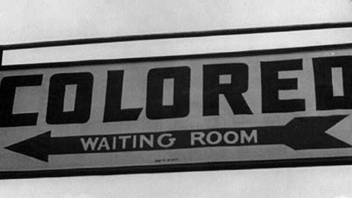 Sign at the Greyhound bus station in Rome, Ga., in 1943. (Library of Congress)