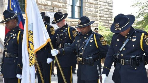 DeKalb Police Honor Guard pause for a moment of silence in a file photo.