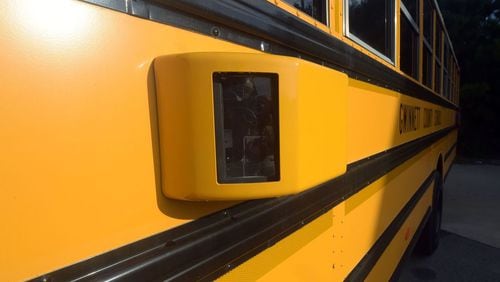 Gwinnett County is using cameras like this to catch motorists who pass school buses when they stop to pick up or drop off students. KENT JOHNSON / AJC.COM