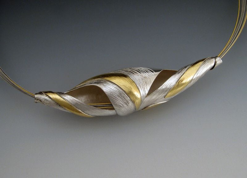 Betty Helen Longhi, a nationally recognized metalsmith, incorporates various texturing techniques with forging and shell forming in her finely crafted jewelry.  