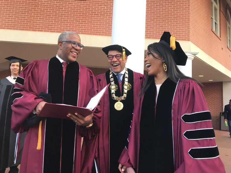 (from left) Tech billionaire Robert F. Smith, Morehouse College President David Thomas and actress Angela Bassett prepare to walk to the graduation ceremonies at the college on Sunday, May 19, 2019. Smith and Bassett received honorary degrees. 