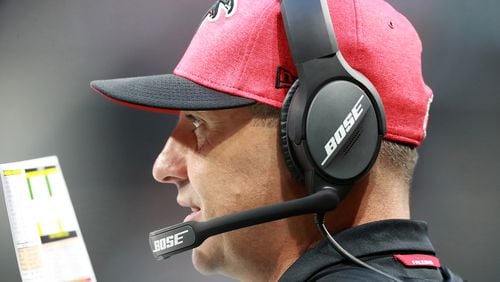 Atlanta Falcons offensive coordinator Steve Sarkisian calls a play from the sidelines.