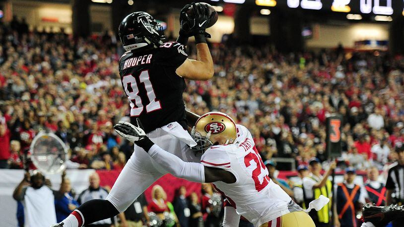 Austin Hooper's touchdown grab over San Francisco's Jaquiski Tartt  during the first half, plus the extra-point kick, gave the Falcons 449 points for the season, surpassing the team mark of 442 set during the 1998 season.