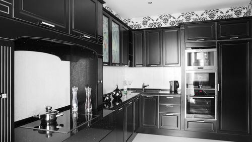 Claire Staszak of Centered by Design says dark kitchens are in for 2018. (Dreamstime)