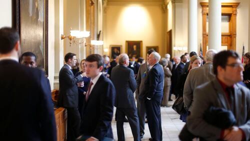 Lobbyists gather at the Georgia Capitol as the first day of the 2016 session gets underway on Jan. 11, 2016.