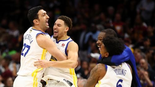 Former Hawks player Zaza Pachulia (left) and Golden State Warriors teammate Andre Iguodala celebrate after defeating the Cleveland Cavaliers during Game 4 of the NBA Finals.  (Photo by Gregory Shamus/Getty Images)