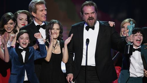LOS ANGELES, CA - JANUARY 29: (L-R) Actors Natalia Dyer, Shannon Purser, Matthew Modine, Noah Schnapp, Winona Ryder, David Harbour, Cara Buono, and Finn Wolfhard of 'Stranger Things' accept Outstanding Performance by an Ensemble in a Drama Series onstage during The 23rd Annual Screen Actors Guild Awards at The Shrine Auditorium on January 29, 2017 in Los Angeles, California. 26592_014 (Photo by Kevin Winter/Getty Images )