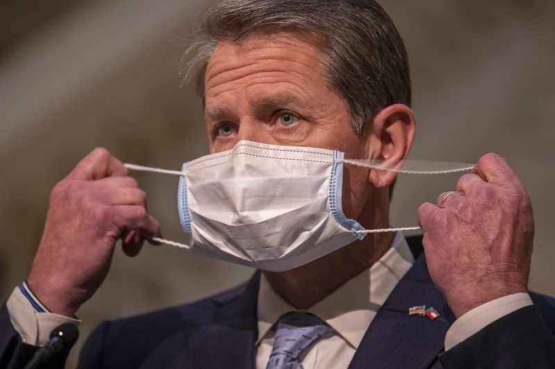 The coronavirus pandemic remained a polarizing issue in 2021, as Georgia lagged behind most U.S. states in vaccinations rates. Gov. Brian Kemp joined in court efforts opposing mask mandates and federal vaccination requirements. (Alyssa Pointer / Alyssa.Pointer@ajc.com)