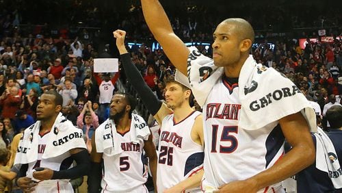 From left to right, Atlanta Hawks Paul Millsap, DeMarre Carroll, Kyle Korver and Al Horford celebrate after setting a franchise record by defeating the Oklahoma Thunder 103-93 in an NBA basketball game on Friday, Jan. 23, 2015, in Atlanta. (AP Photo/Atlanta Journal-Constitution, Curtis Compton) MARIETTA DAILY OUT; GWINNETT DAILY POST OUT; LOCAL TELEVISION OUT; WXIA-TV OUT; WGCL-TV OUT They just don't lose. (Curtis Compton/AJC photo)