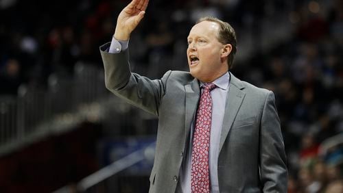 Atlanta Hawks head coach Mike Budenholzer stands on the sideline in the first quarter of an NBA basketball game against the Orlando Magic in Atlanta, Tuesday, Dec. 13, 2016. (AP Photo/David Goldman)