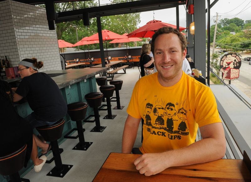 Grind house Killer Burgers owner Alex Brounstein on the rooftop in Decatur. (BECKY STEIN PHOTOGRAPHY)
